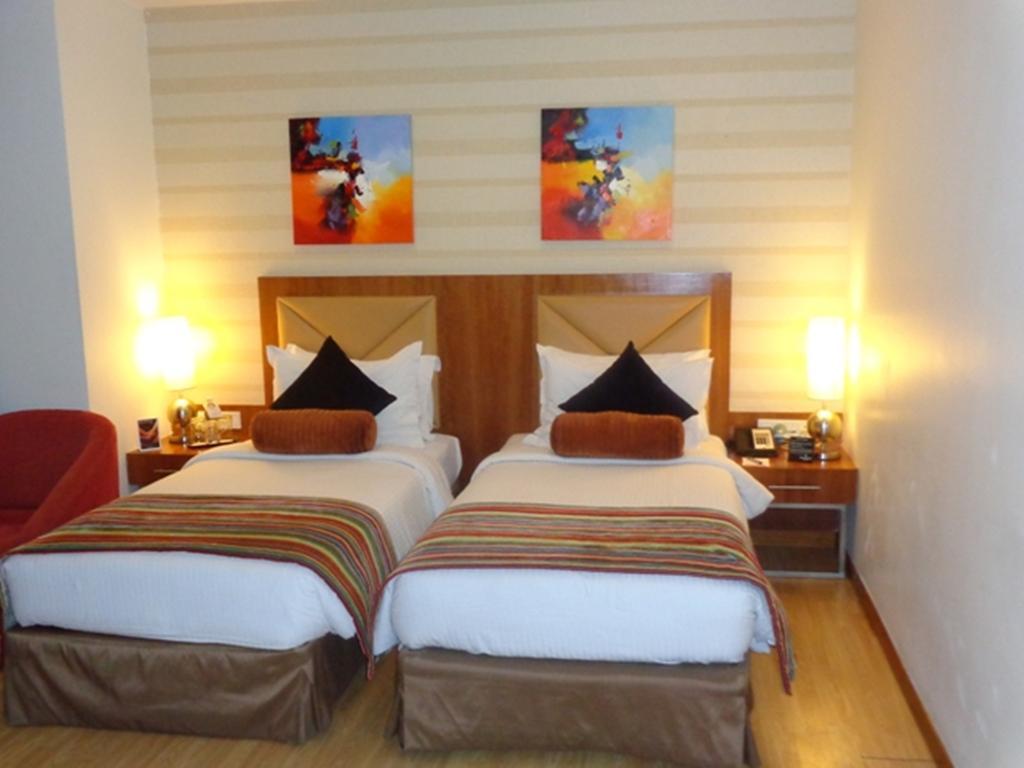 Hotel Ramada Ahmadábád Pokoj fotografie