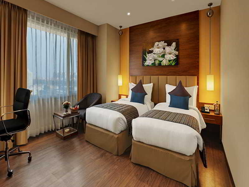 Hotel Ramada Ahmadábád Pokoj fotografie